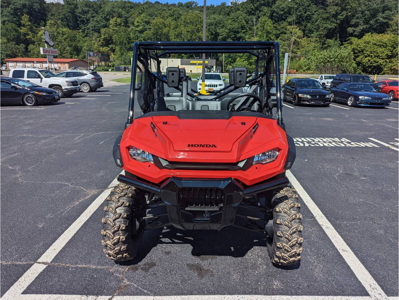 A photo of this 2025 Honda Pioneer 1000-6 Crew Deluxe