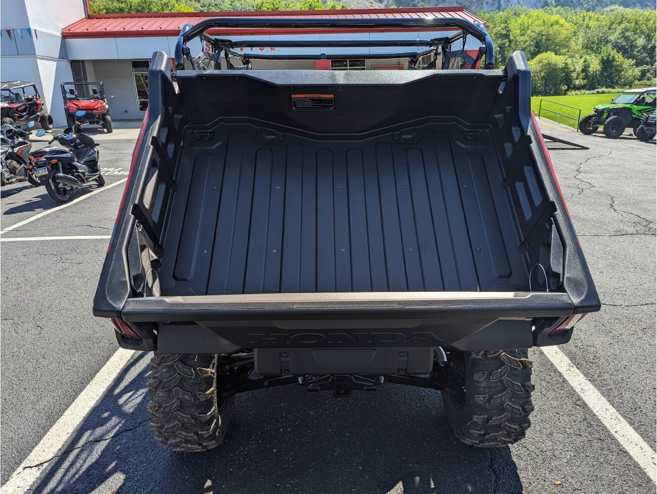 A photo of this 2025 Honda Pioneer 1000-6 Crew Deluxe