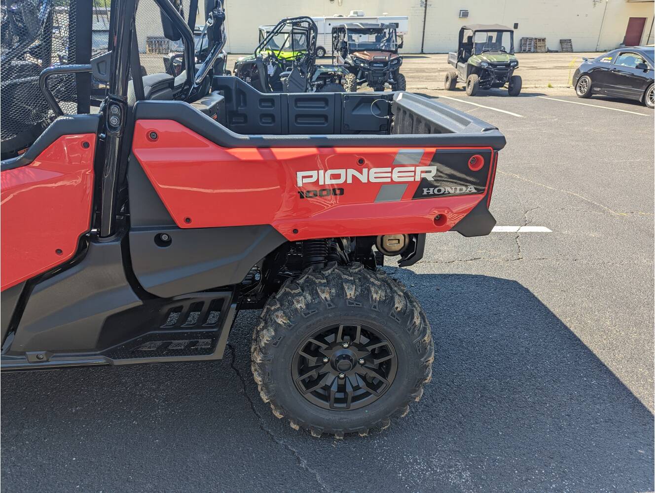 A photo of this 2025 Honda Pioneer 1000-6 Crew Deluxe