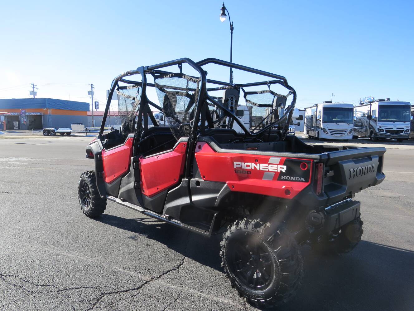 A photo of this 2025 Honda Pioneer 1000-6 Crew Deluxe