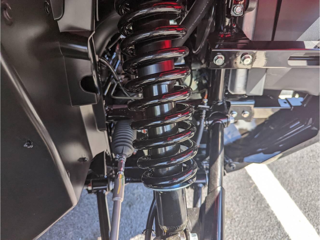 A photo of this 2025 Honda Pioneer 1000-6 Crew Deluxe
