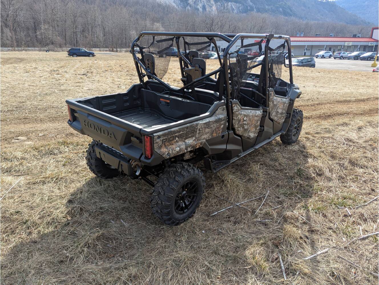 A photo of this 2025 Honda Pioneer 1000-6 Crew Deluxe