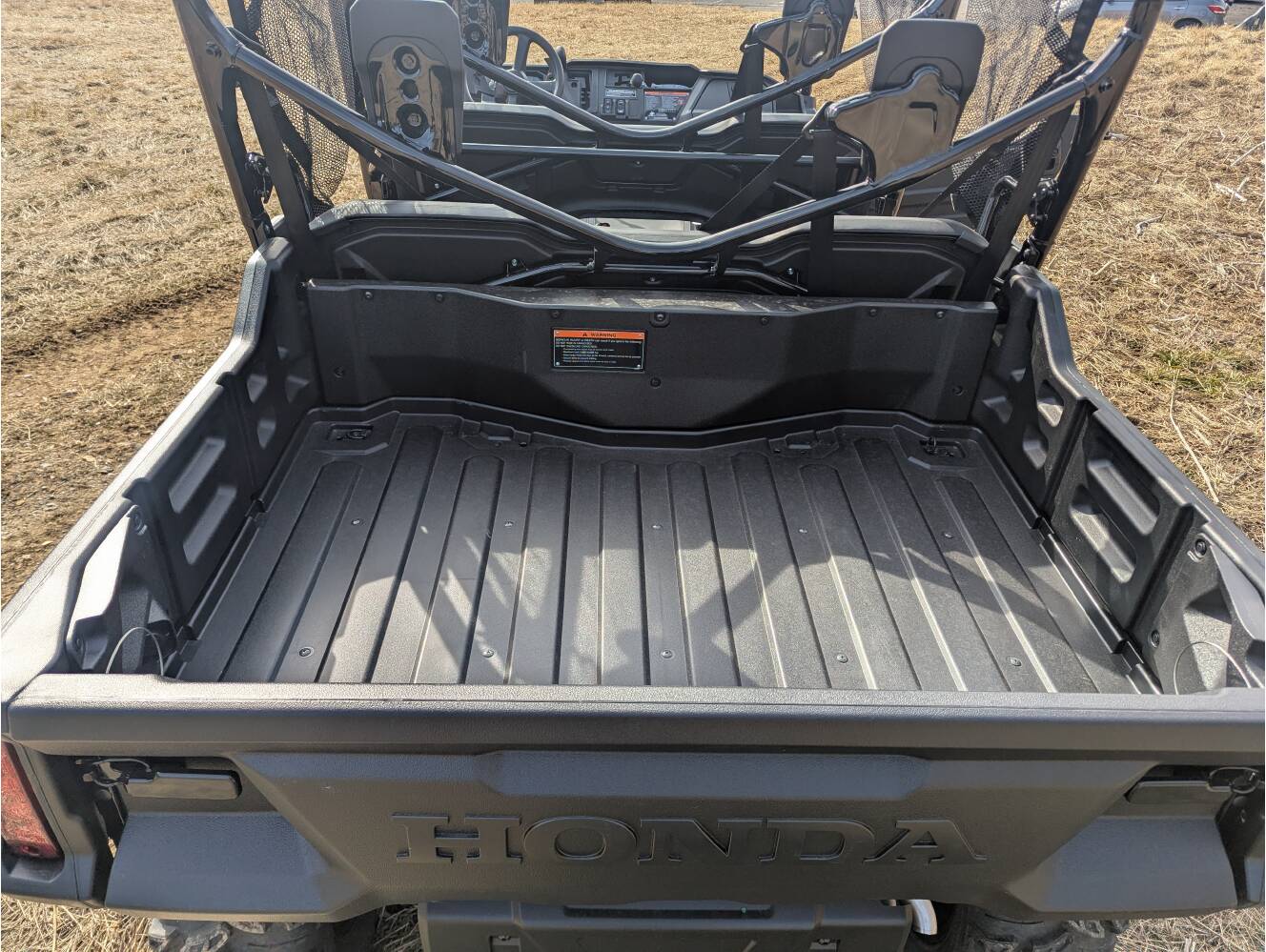 A photo of this 2025 Honda Pioneer 1000-6 Crew Deluxe