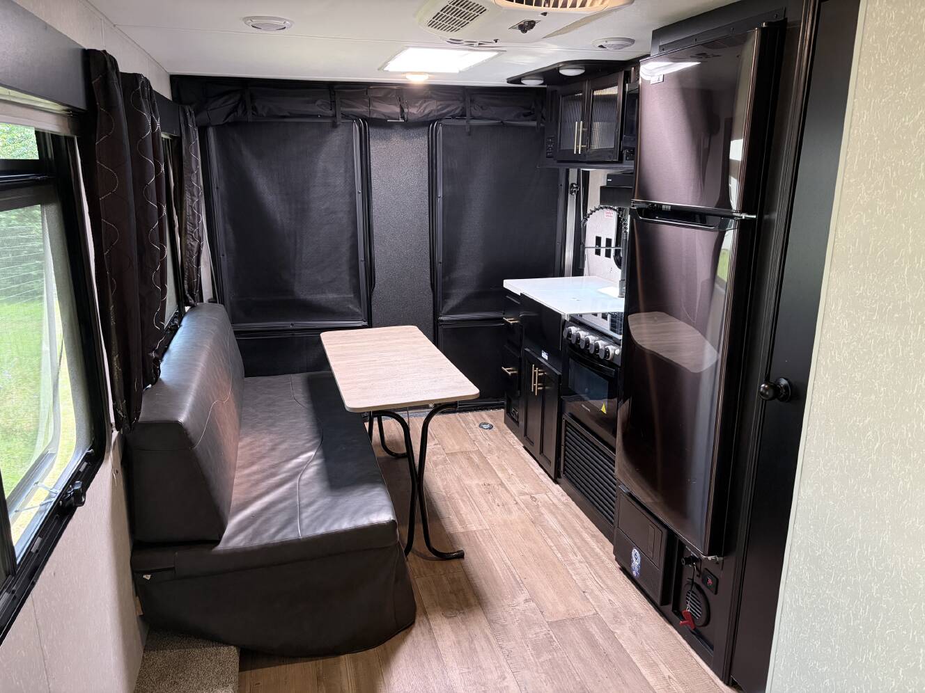 A photo of this 2022 Forest River CHEROKEE GREY WOLF BLACK LABEL TOY HAULER 18RRBL