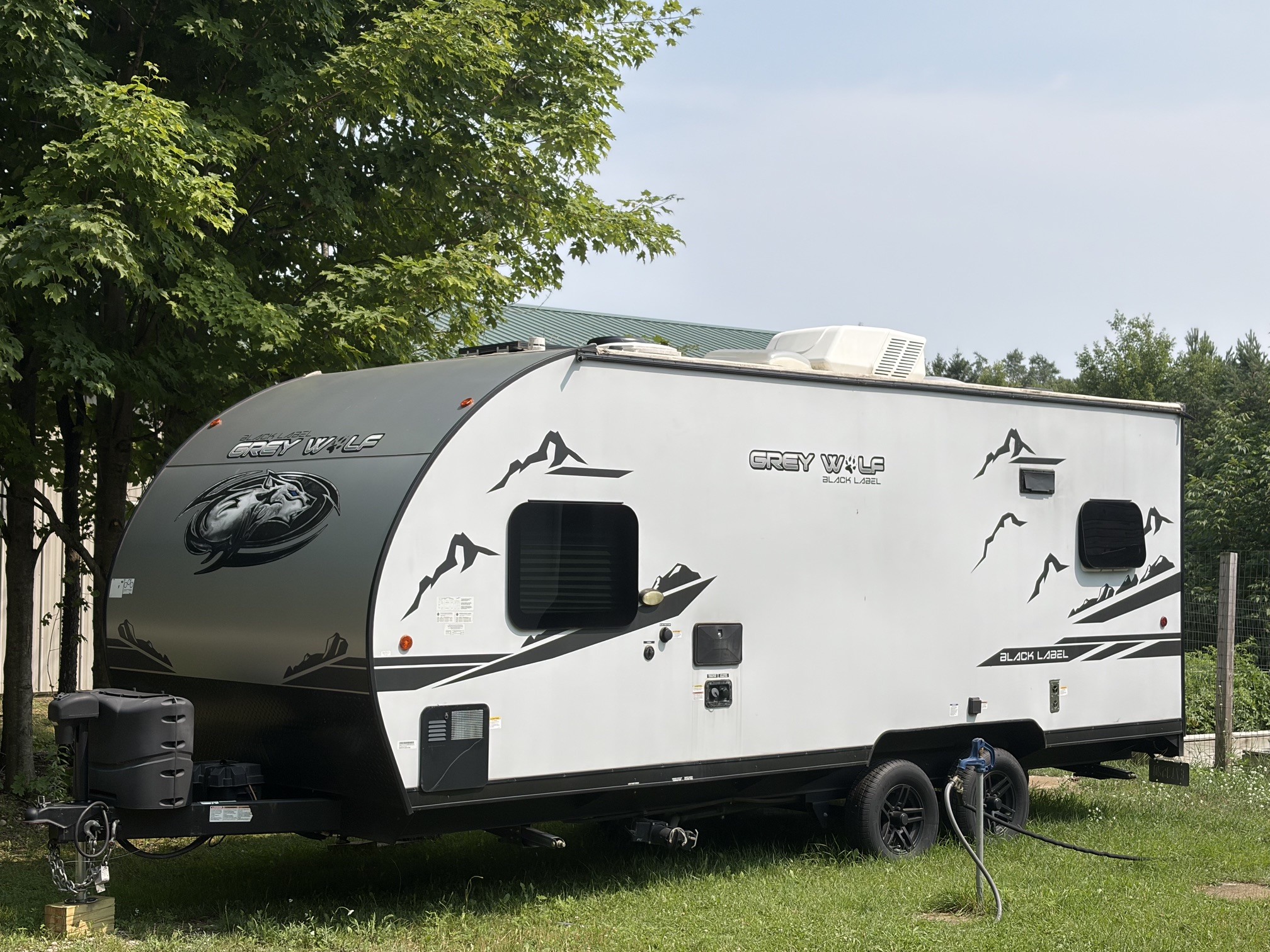 2022 Forest River CHEROKEE GREY WOLF BLACK LABEL TOY HAULER 18RRBL in cadillac MI