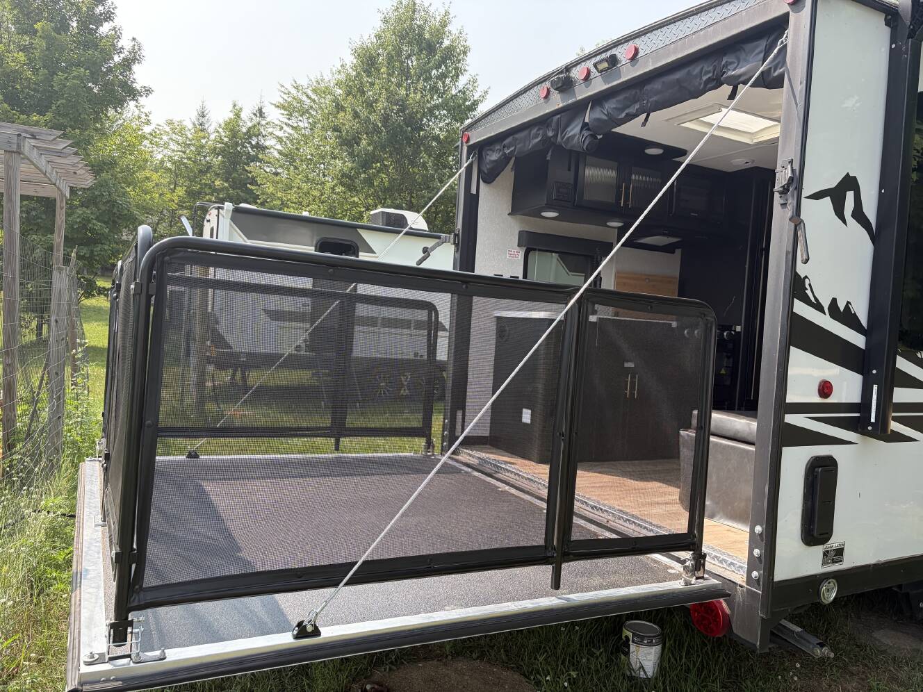A photo of this 2022 Forest River CHEROKEE GREY WOLF BLACK LABEL TOY HAULER 18RRBL