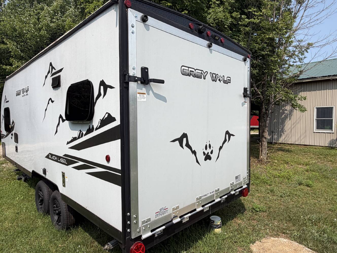 A photo of this 2022 Forest River CHEROKEE GREY WOLF BLACK LABEL TOY HAULER 18RRBL