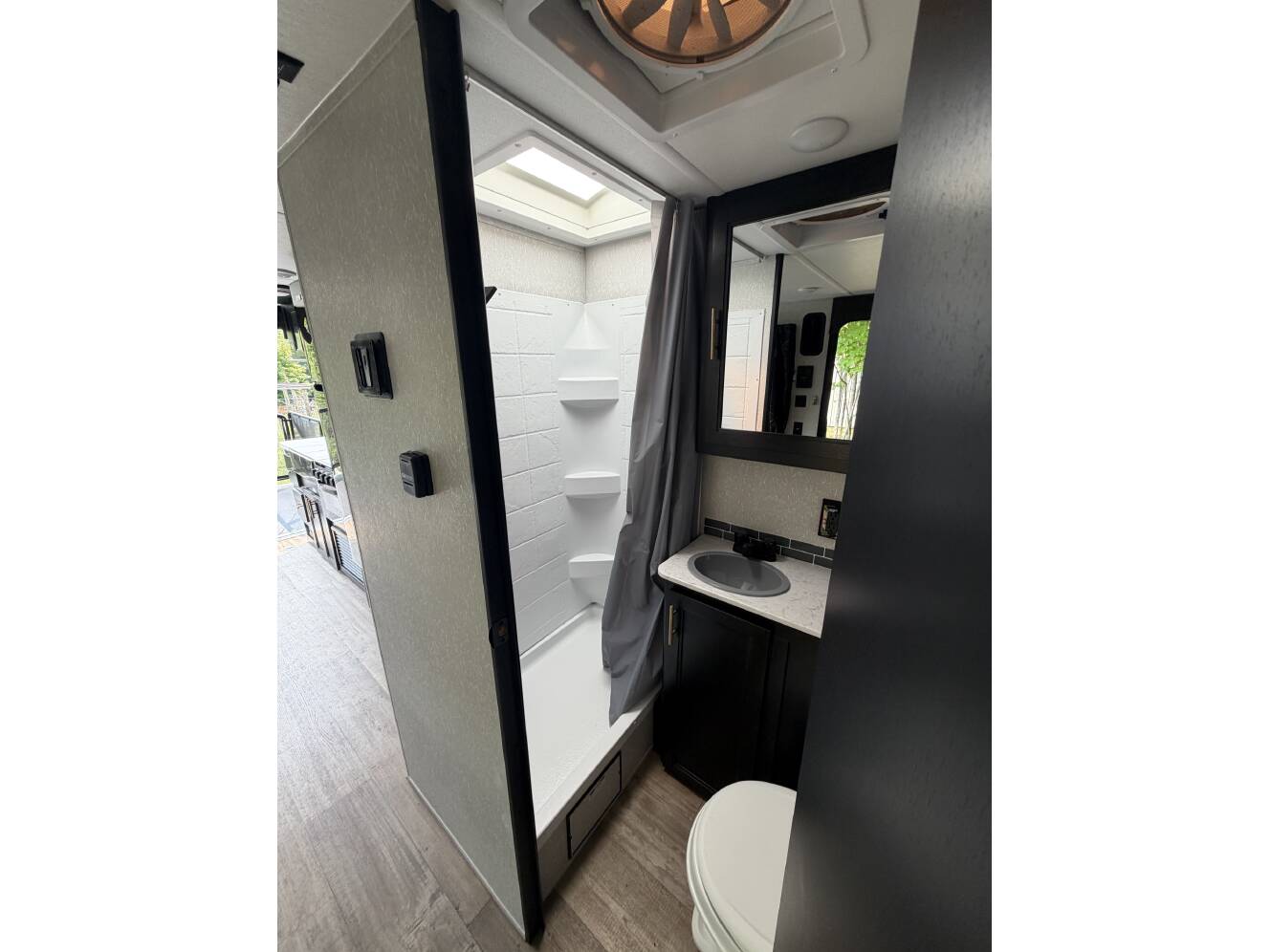A photo of this 2022 Forest River CHEROKEE GREY WOLF BLACK LABEL TOY HAULER 18RRBL