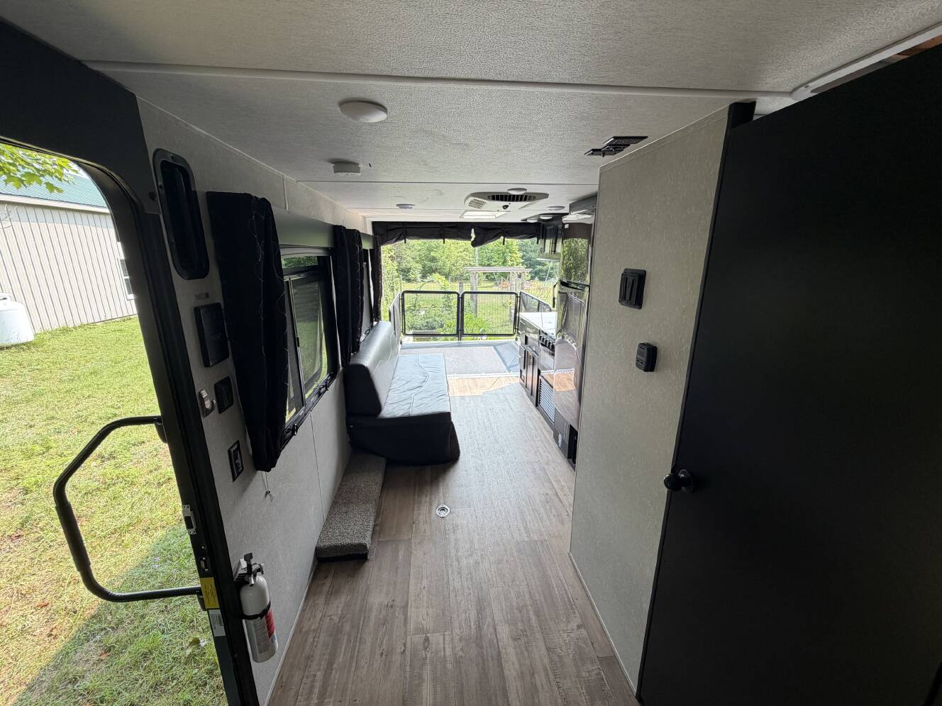 A photo of this 2022 Forest River CHEROKEE GREY WOLF BLACK LABEL TOY HAULER 18RRBL