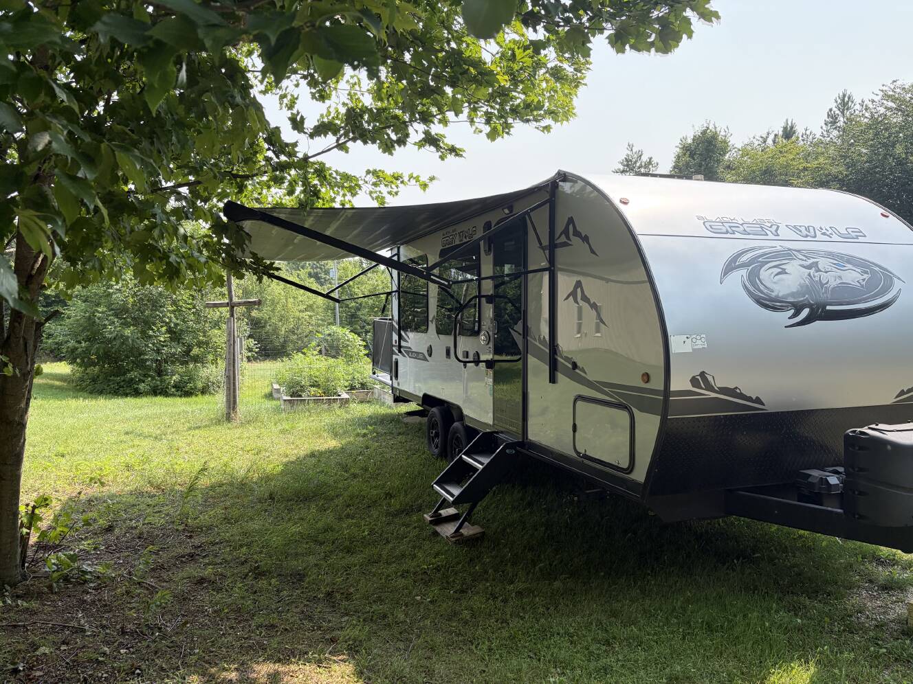 A photo of this 2022 Forest River CHEROKEE GREY WOLF BLACK LABEL TOY HAULER 18RRBL