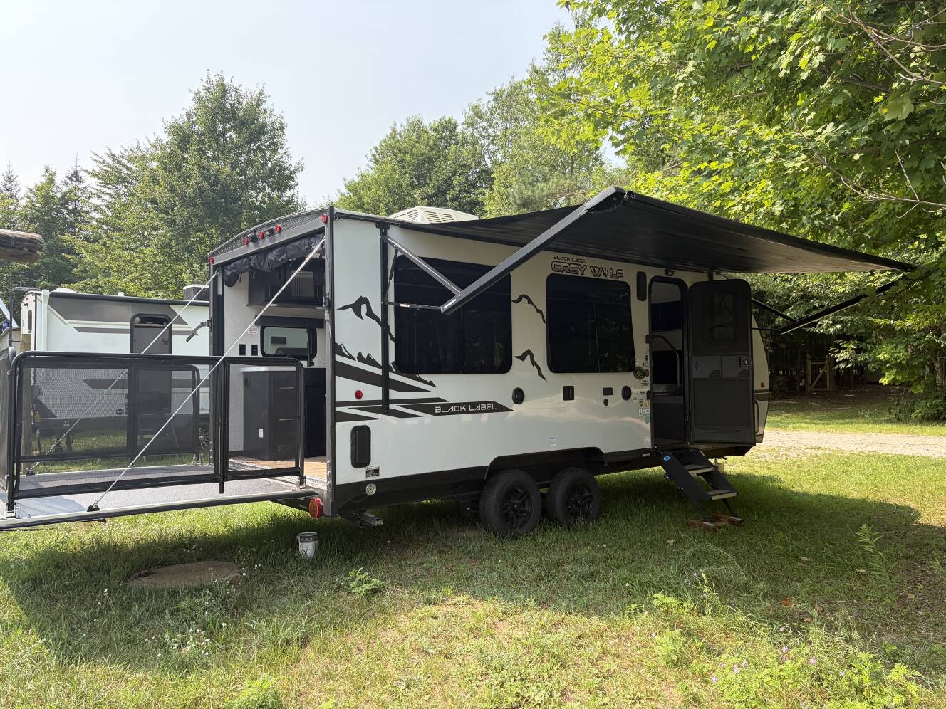 A photo of this 2022 Forest River CHEROKEE GREY WOLF BLACK LABEL TOY HAULER 18RRBL