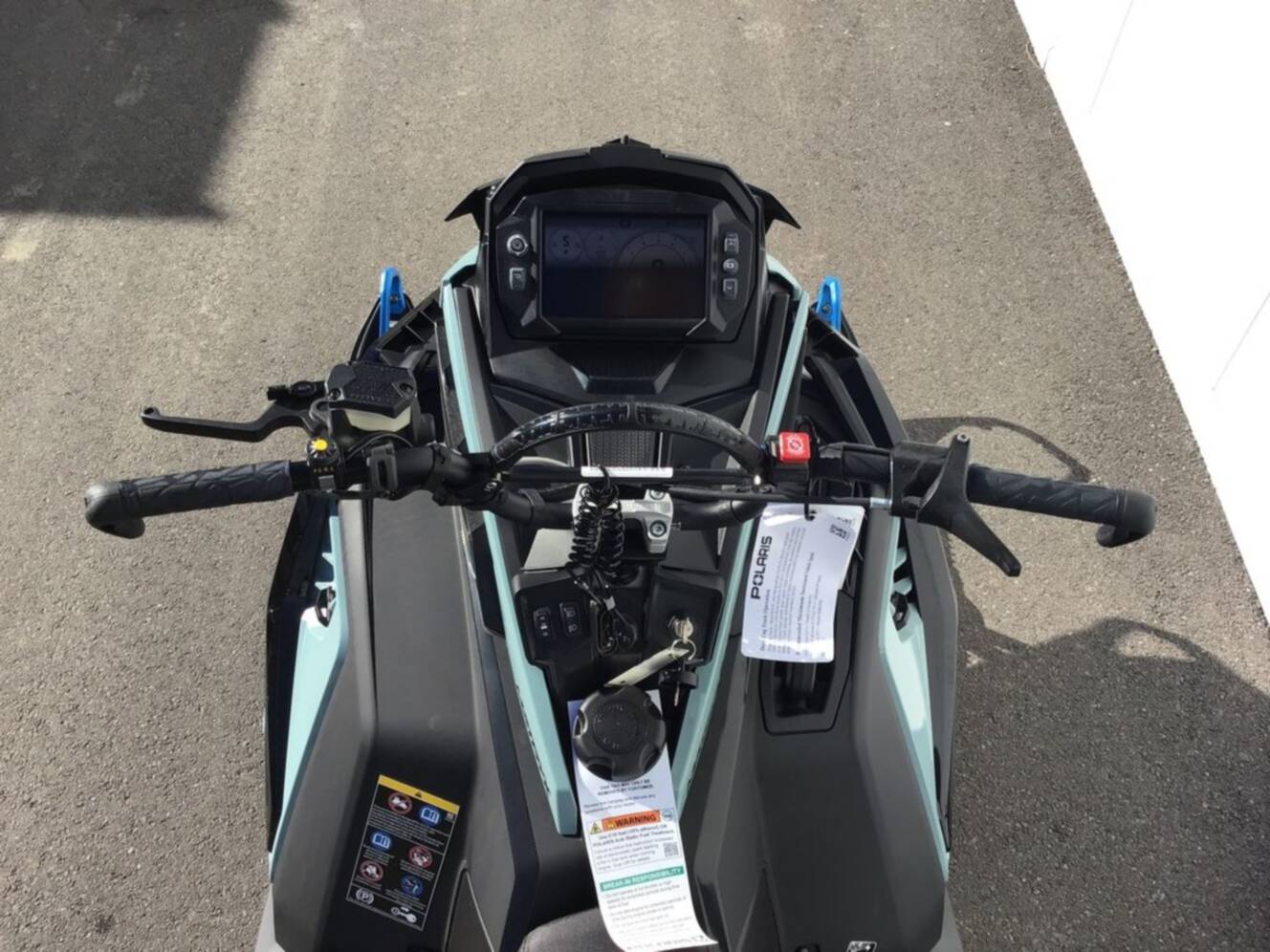 A photo of this 2026 Polaris® 850 PRO RMK 165 Hemlock Blue / Black / Velocity Blue