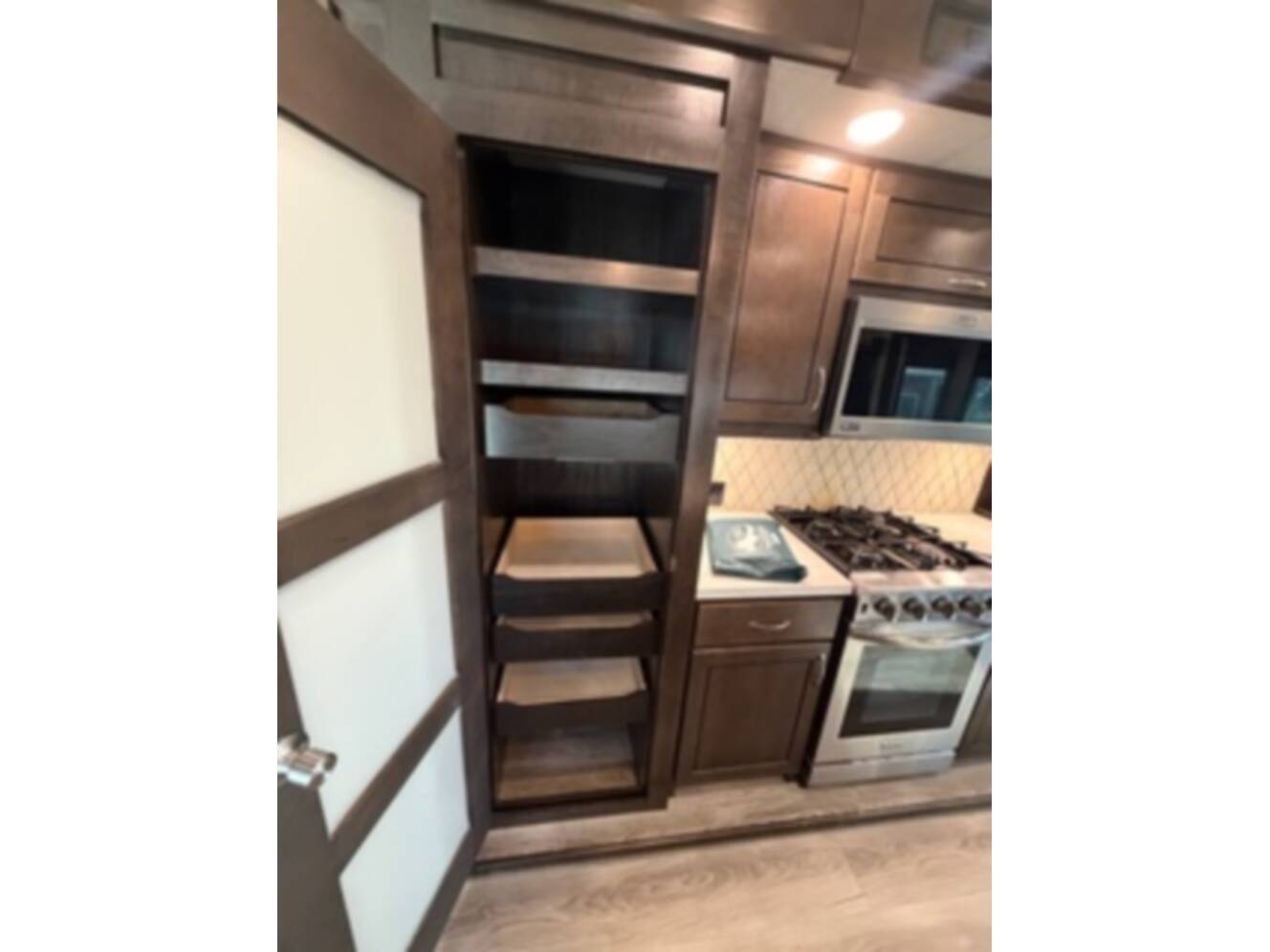 A photo of this 2021 Forest River CEDAR CREEK 40CCK