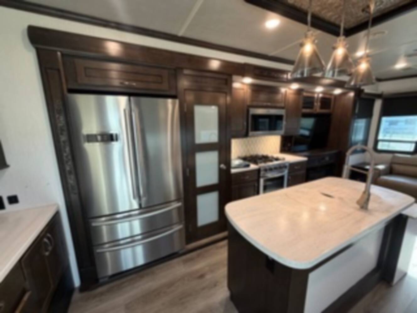 A photo of this 2021 Forest River CEDAR CREEK 40CCK