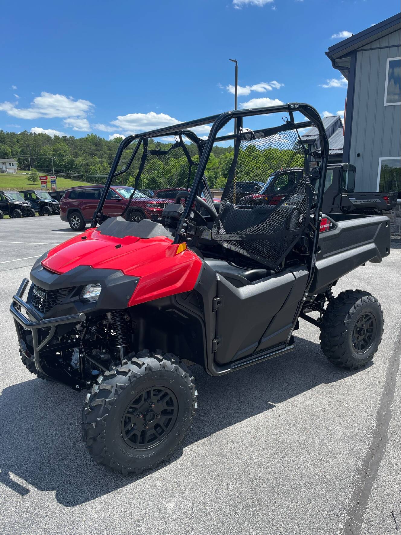 A photo of this 2026 Honda Pioneer 700 Deluxe