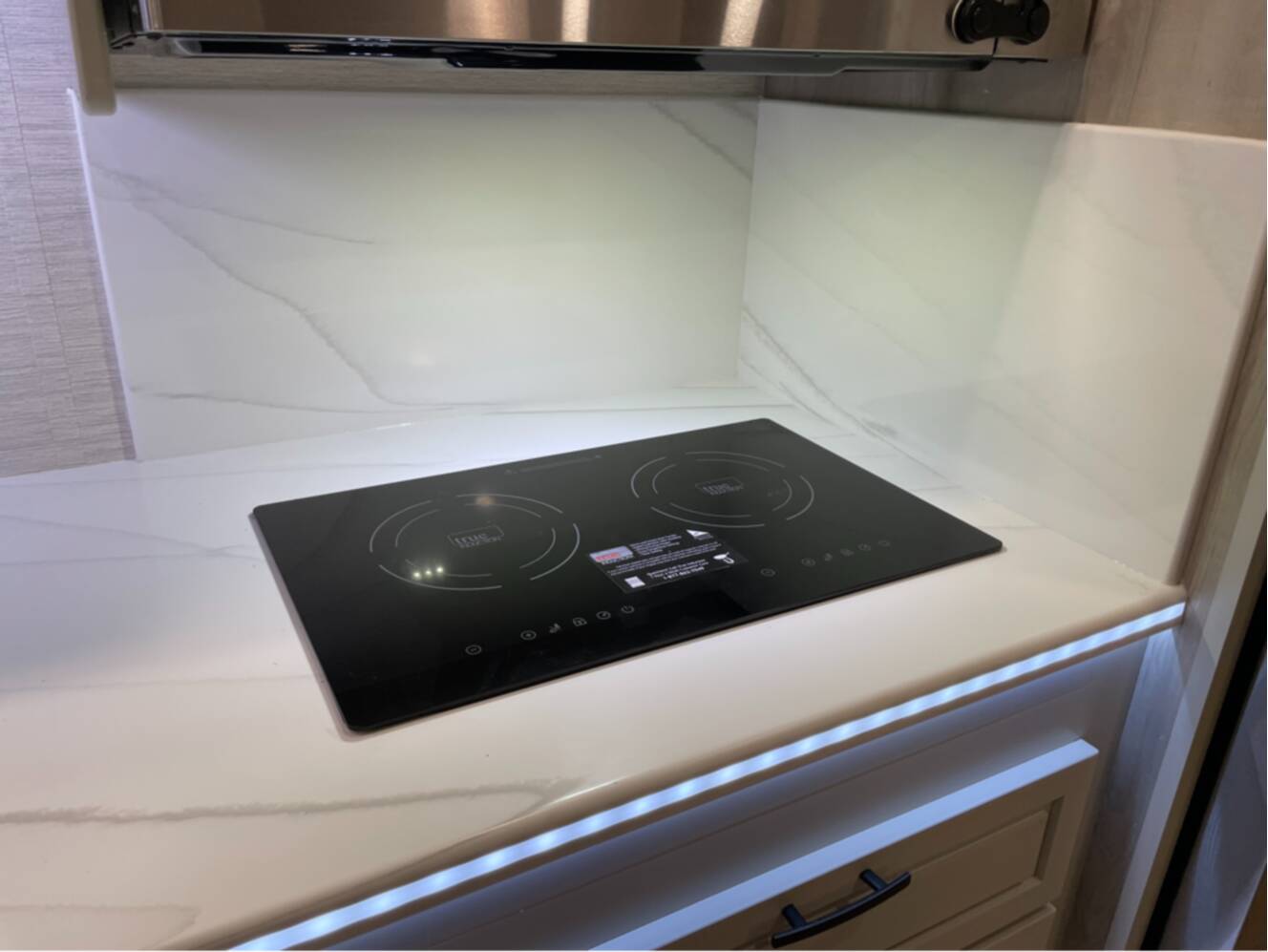 A photo of this 2027 Dynamax DX3 34KD