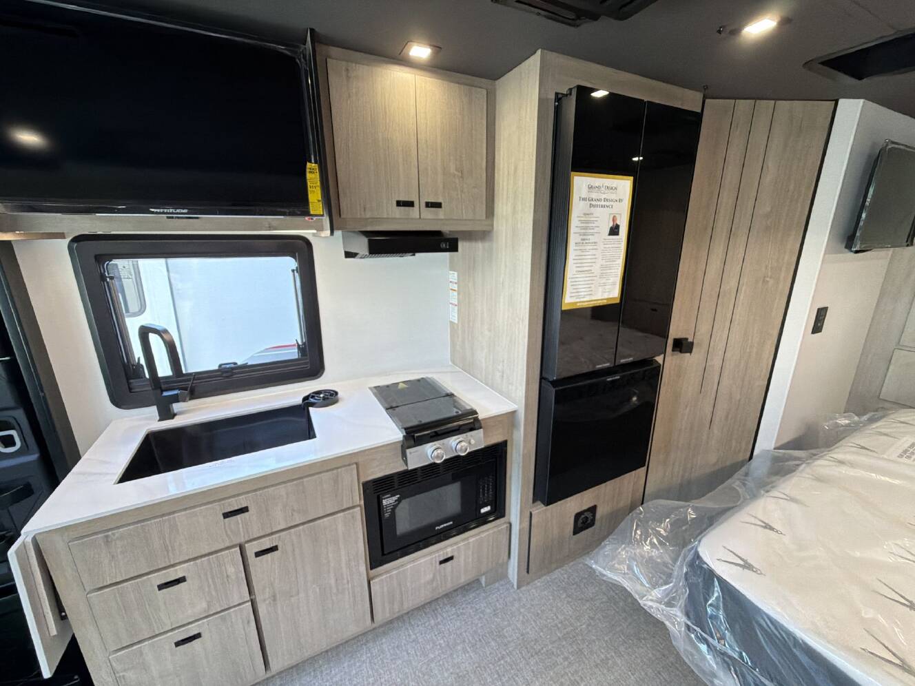 A photo of this 2027 Grand Design Lineage Series M 25FW