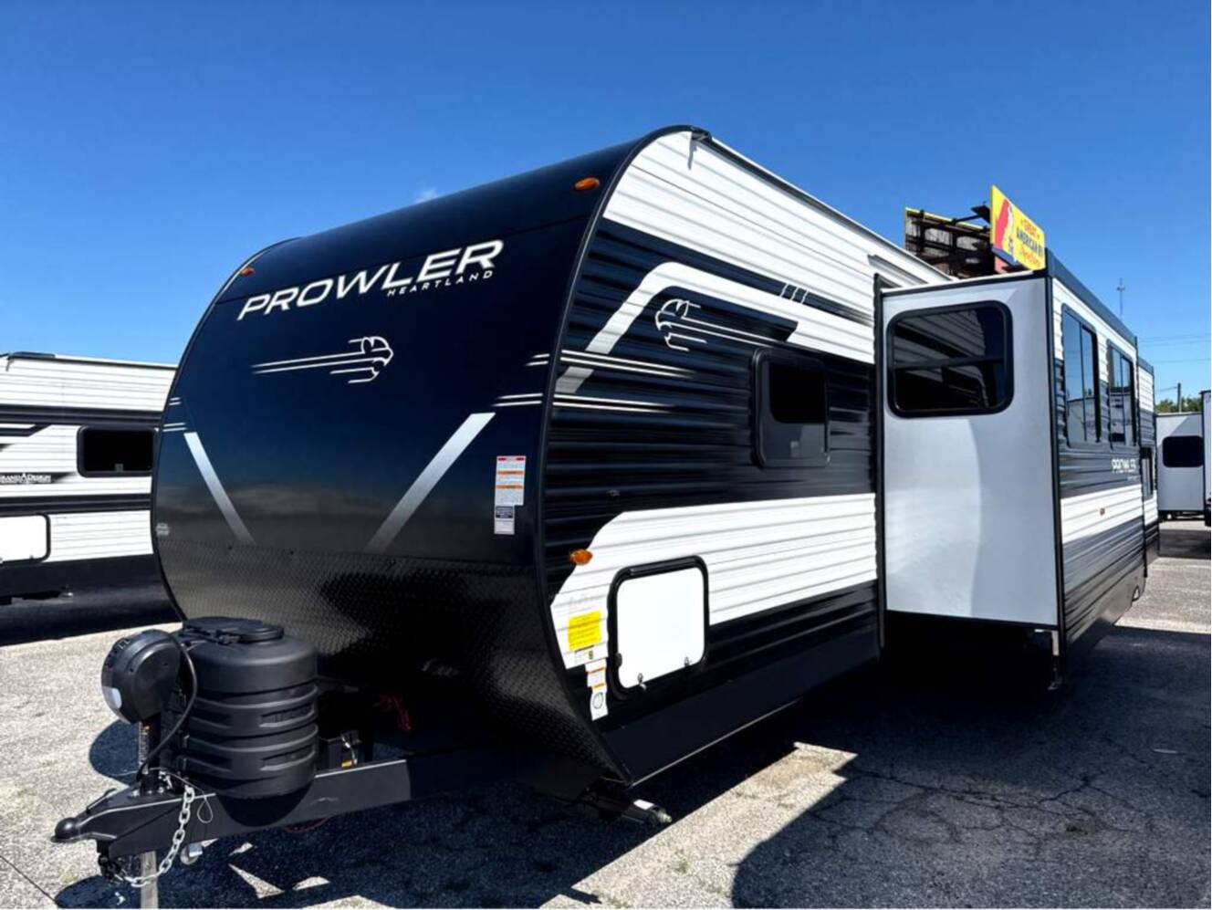A photo of this 2027 Heartland Prowler 3202DSB