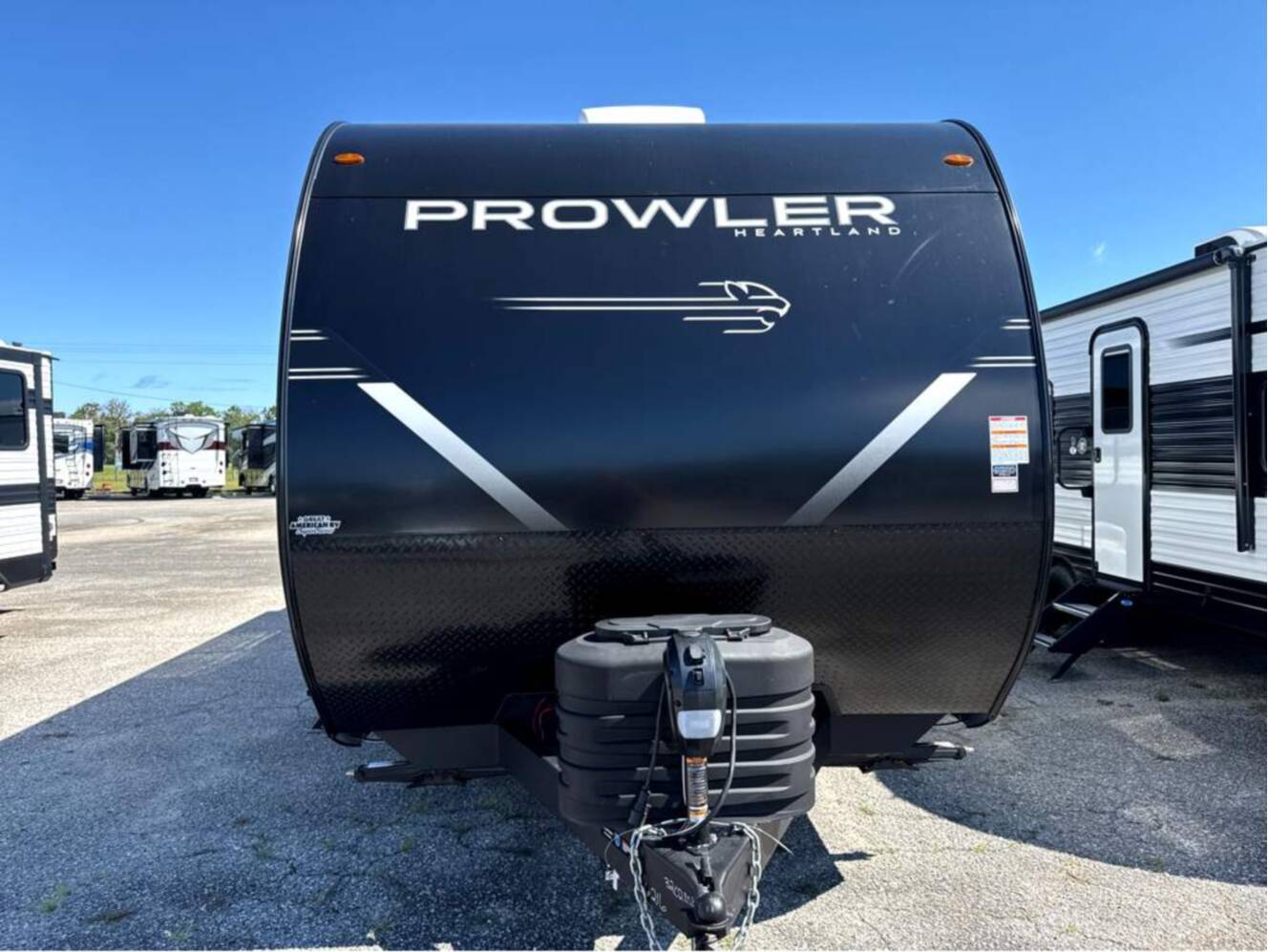 A photo of this 2027 Heartland Prowler 3202DSB