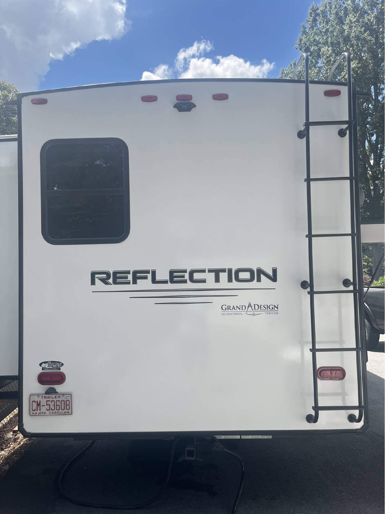 A photo of this 2021 Grand Design REFLECTION 311BHS
