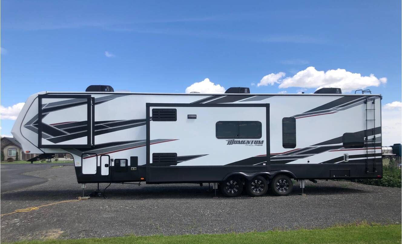 A photo of this 2021 Grand Design MOMENTUM M-CLASS 395M