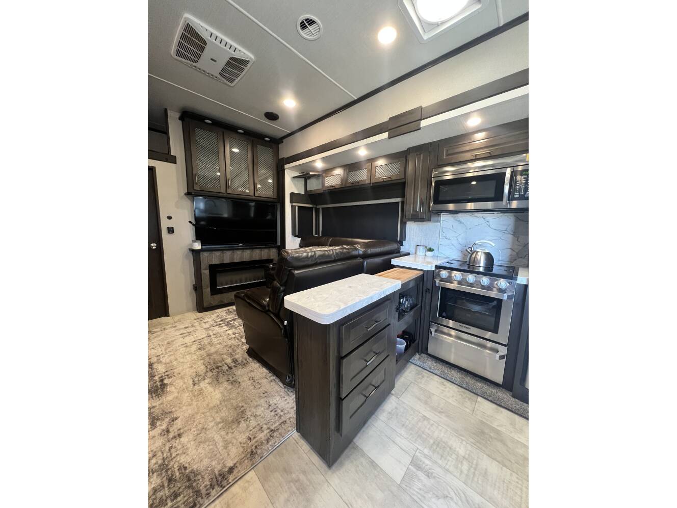 A photo of this 2021 Grand Design MOMENTUM M-CLASS 395M