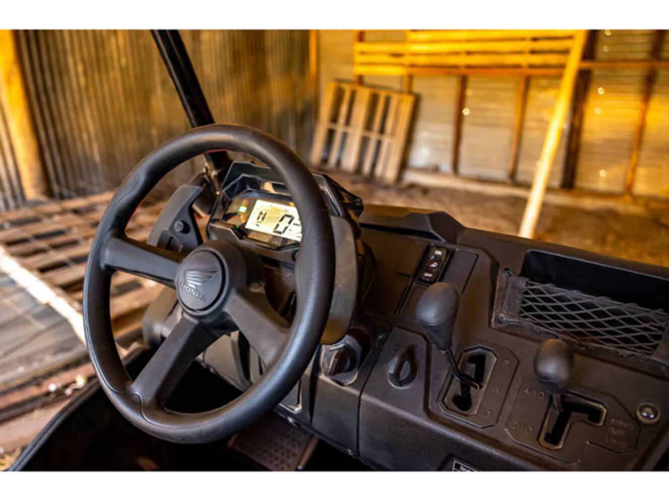 A photo of this 2025 Honda Pioneer 700-4 Forest