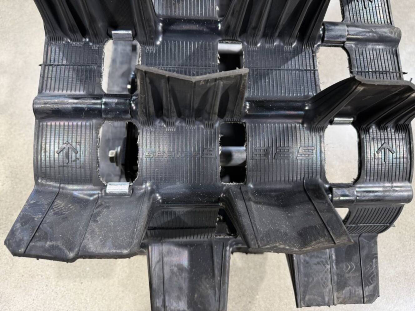 A photo of this 2026 Polaris Patriot Boost RMK Khaos 165 Gloss Black / Blue Dusk