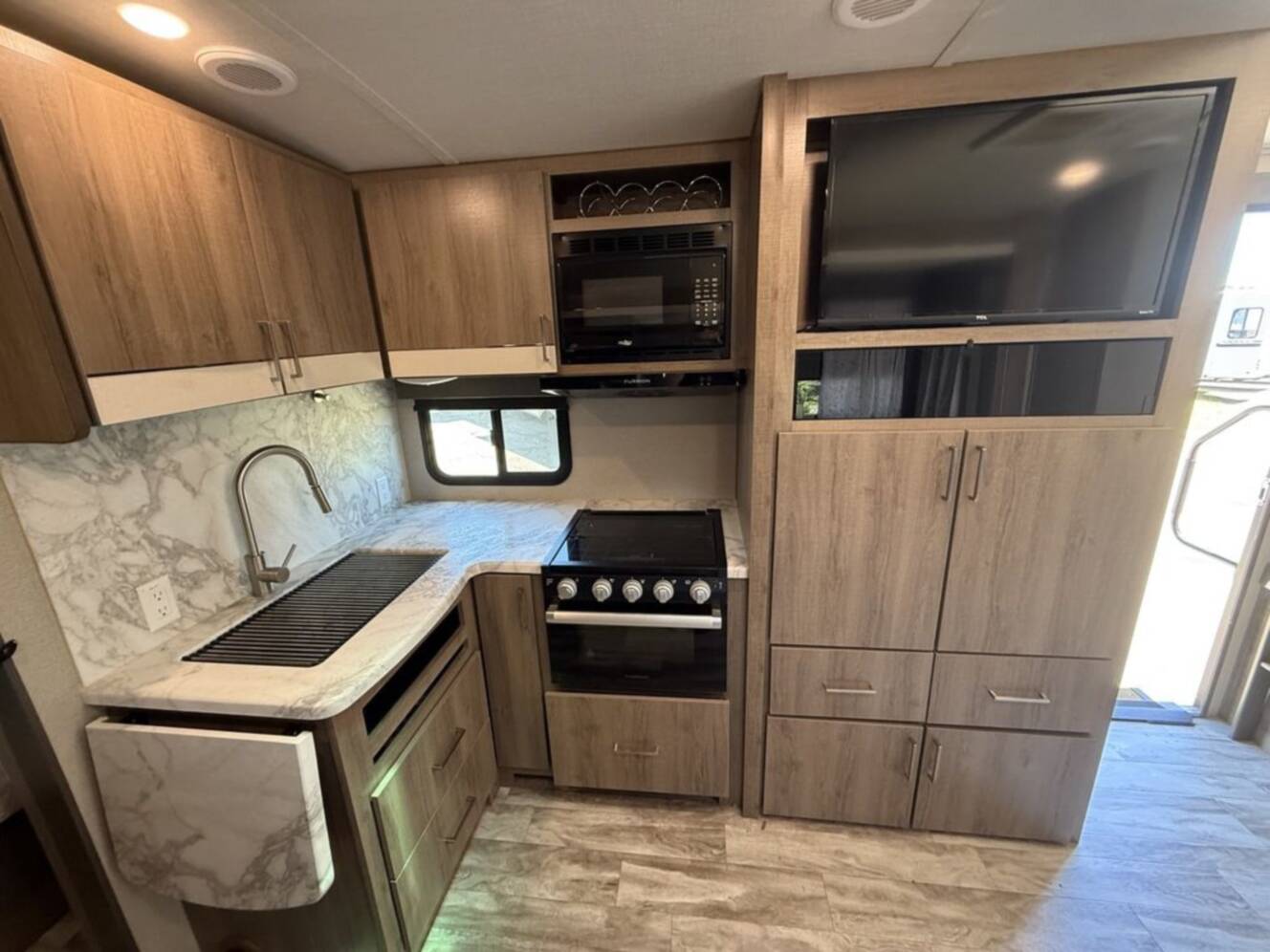 A photo of this 2022 Grand Design Imagine 2400BH