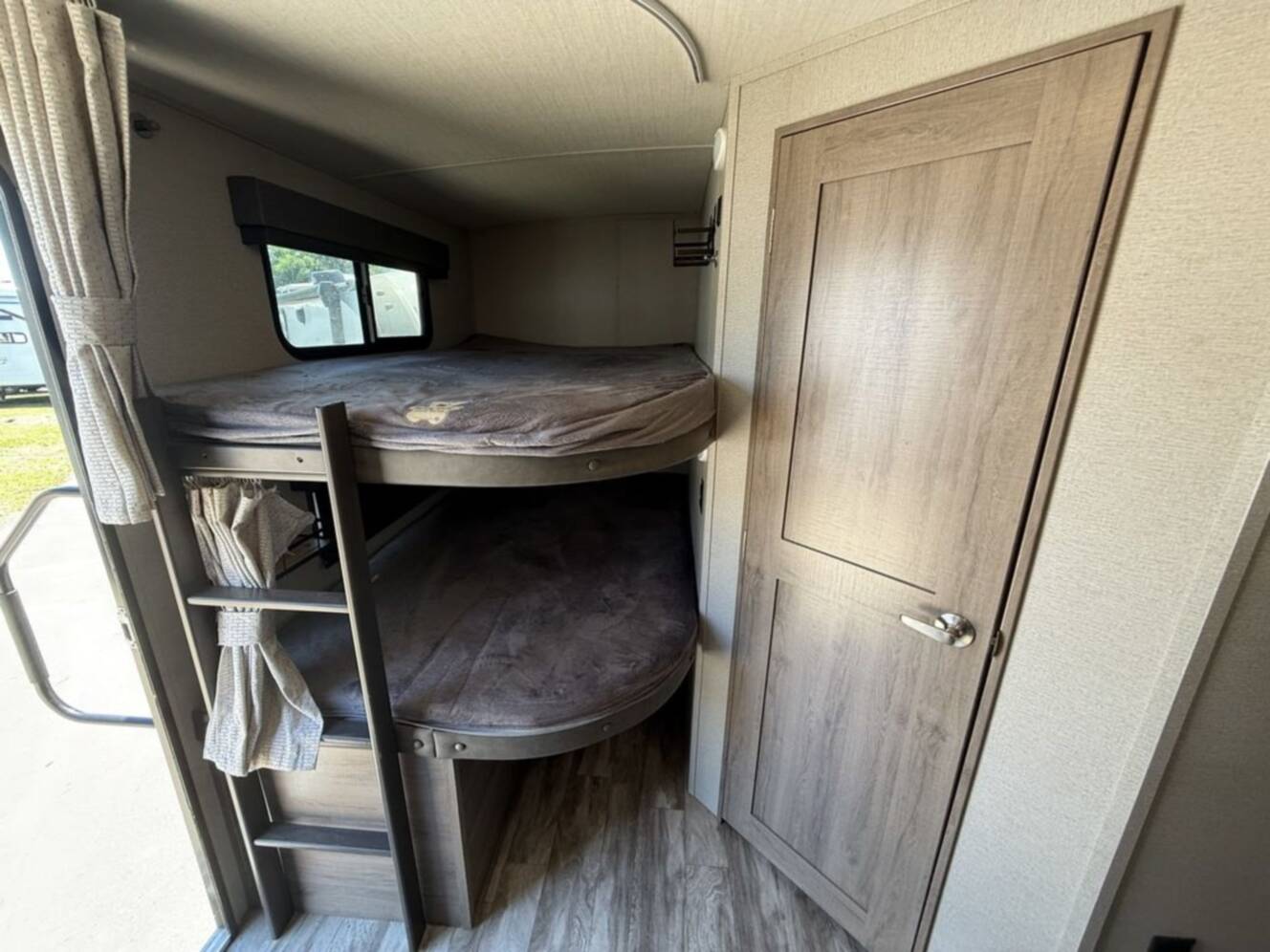 A photo of this 2022 Grand Design Imagine 2400BH