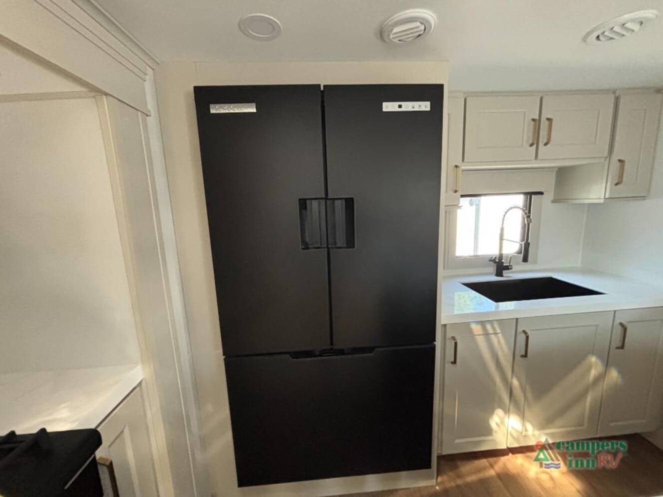 A photo of this 2027 Grand Design Solitude 390RK
