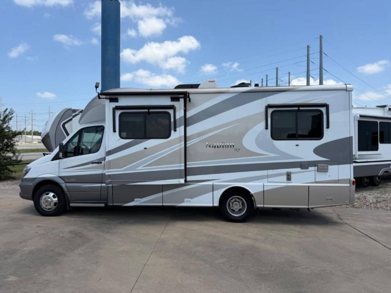 A photo of this 2015 Itasca Navion 24V
