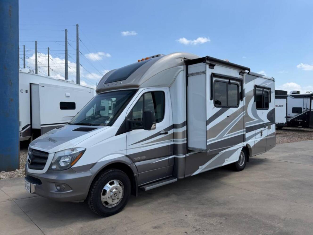 A photo of this 2015 Itasca Navion 24V