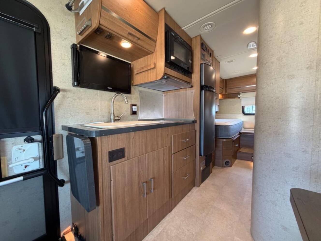 A photo of this 2015 Itasca Navion 24V