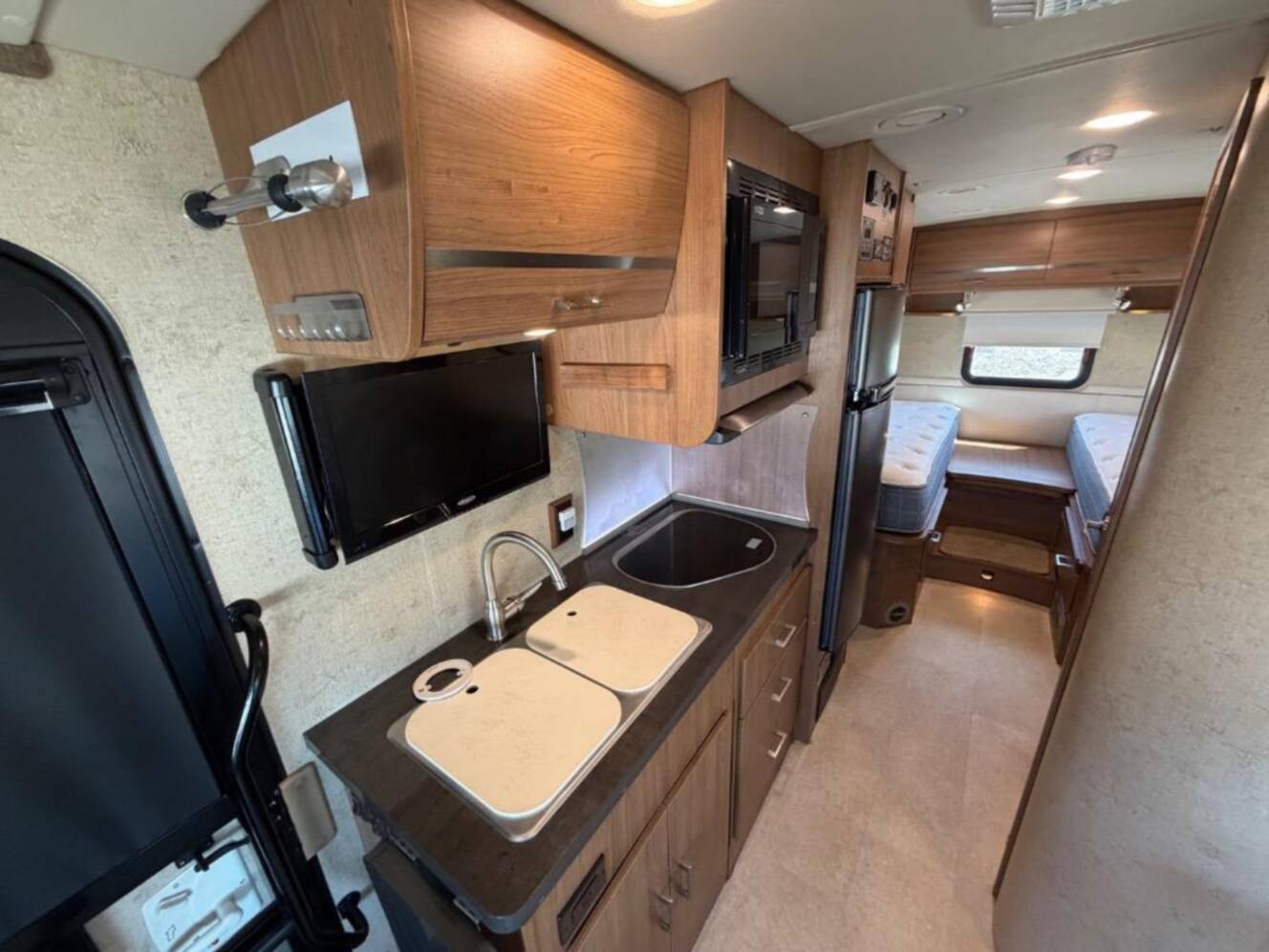 A photo of this 2015 Itasca Navion 24V