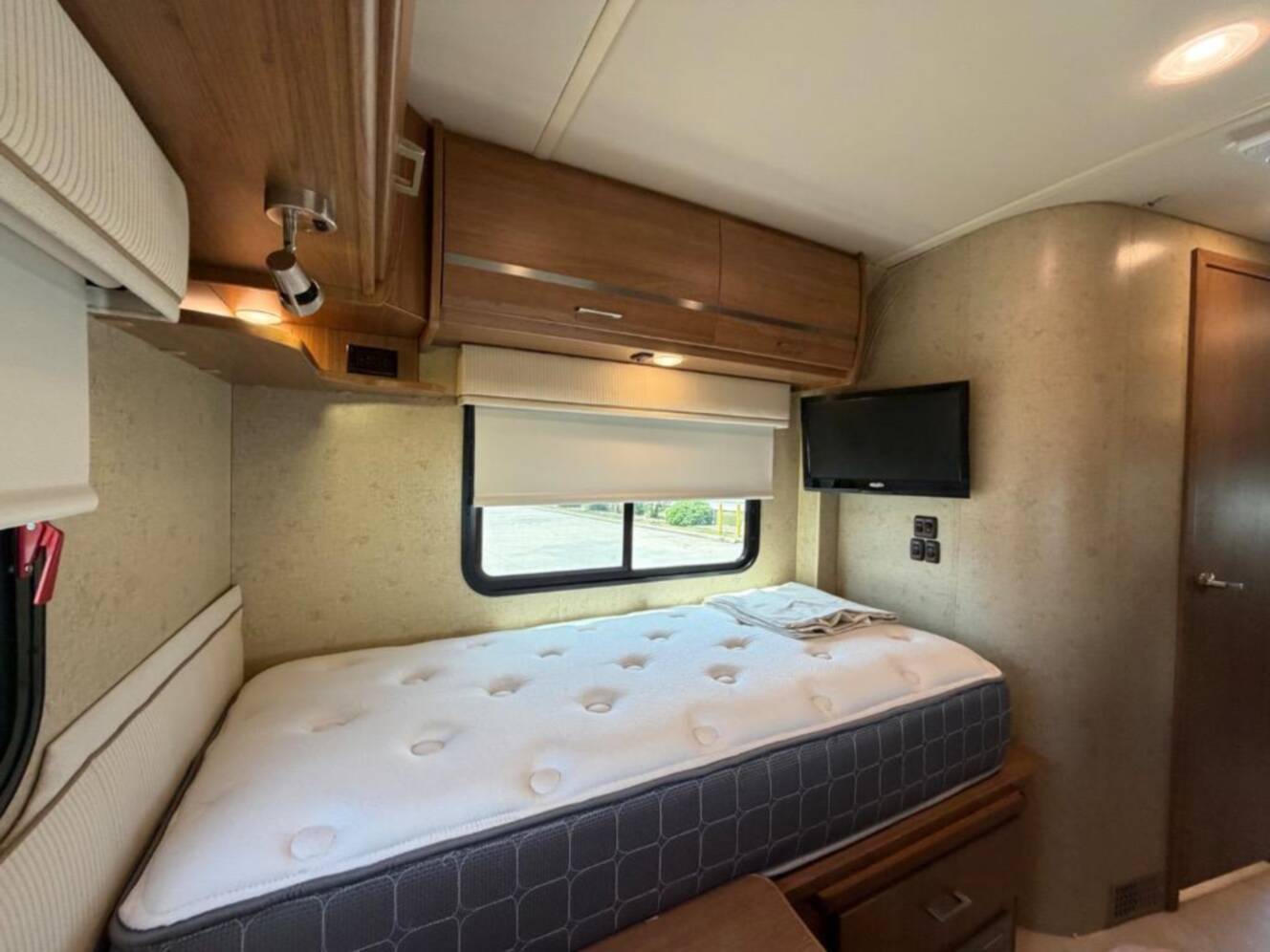 A photo of this 2015 Itasca Navion 24V