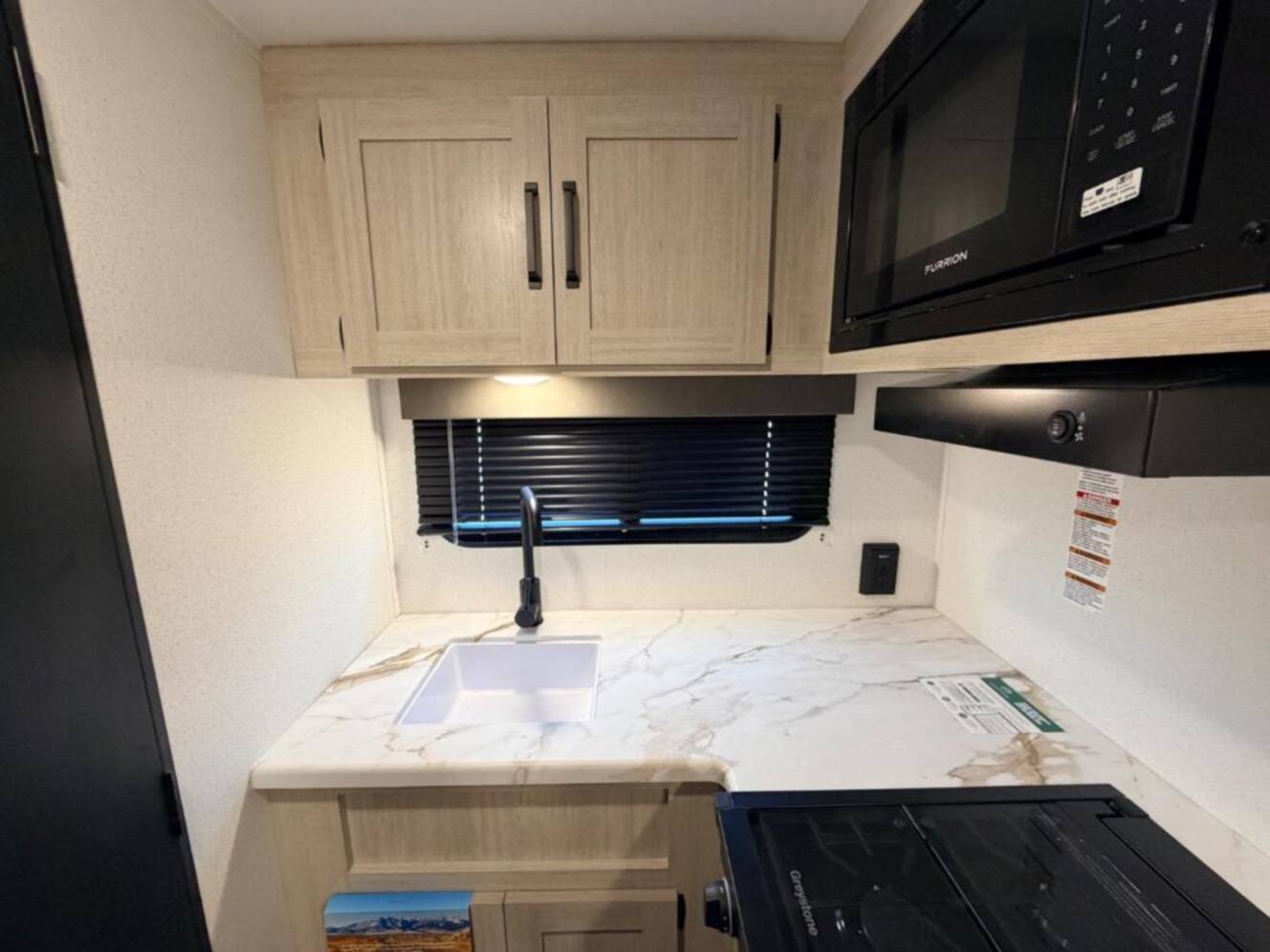 A photo of this 2027 Forest River Rv Puma Camping Edition 121RKCE
