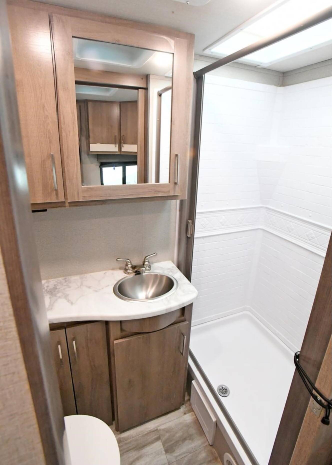 A photo of this 2022 Grand Design IMAGINE XLS 22MLE