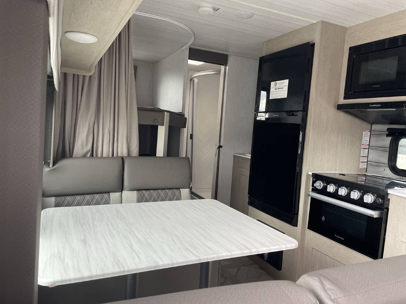 A photo of this 2023 Forest River WILDWOOD X-LITE 19DBXL