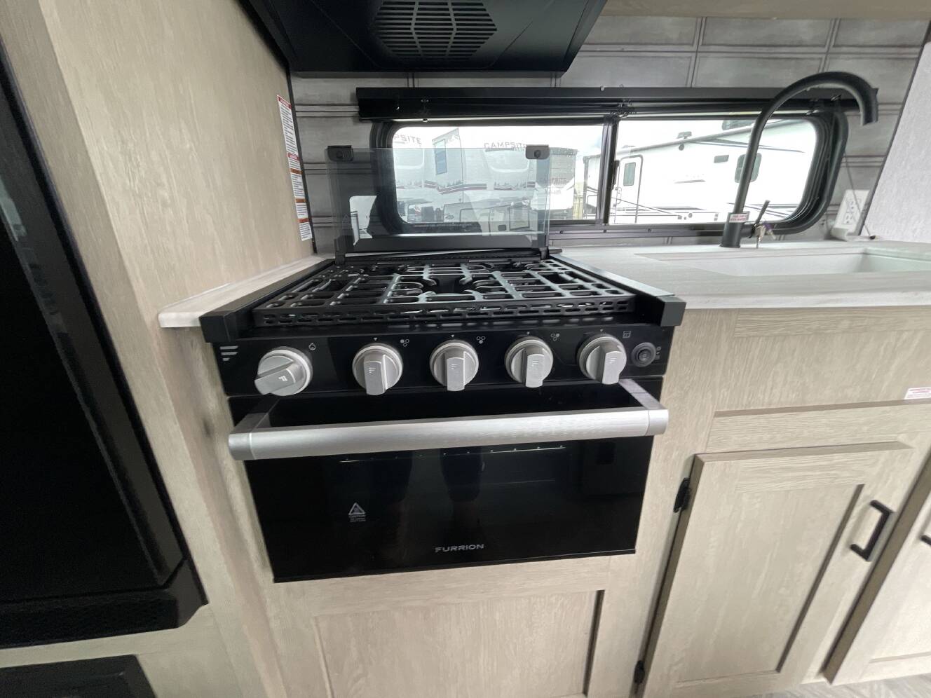 A photo of this 2023 Forest River WILDWOOD X-LITE 19DBXL