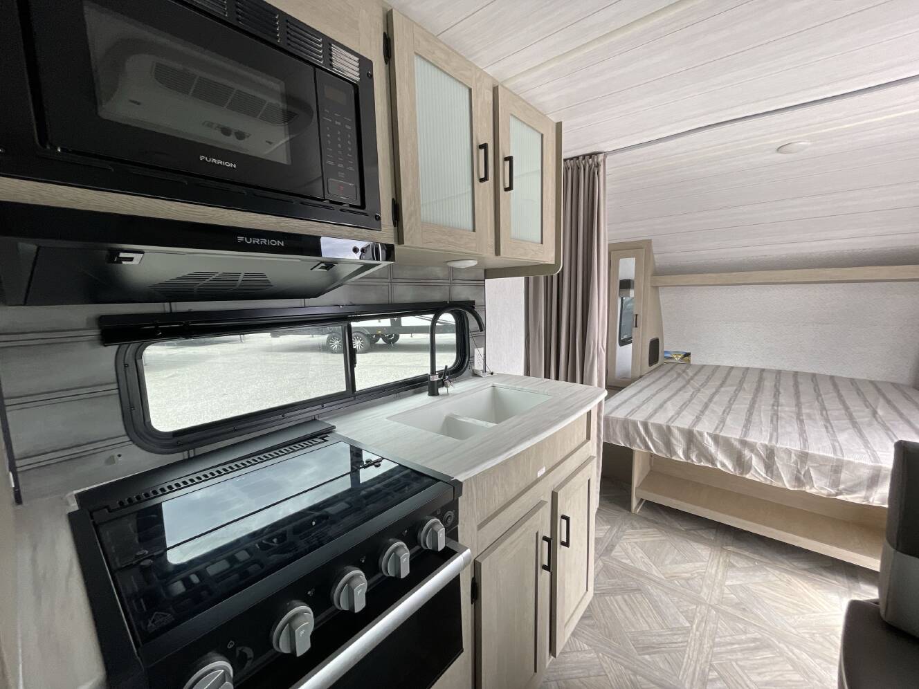 A photo of this 2023 Forest River WILDWOOD X-LITE 19DBXL