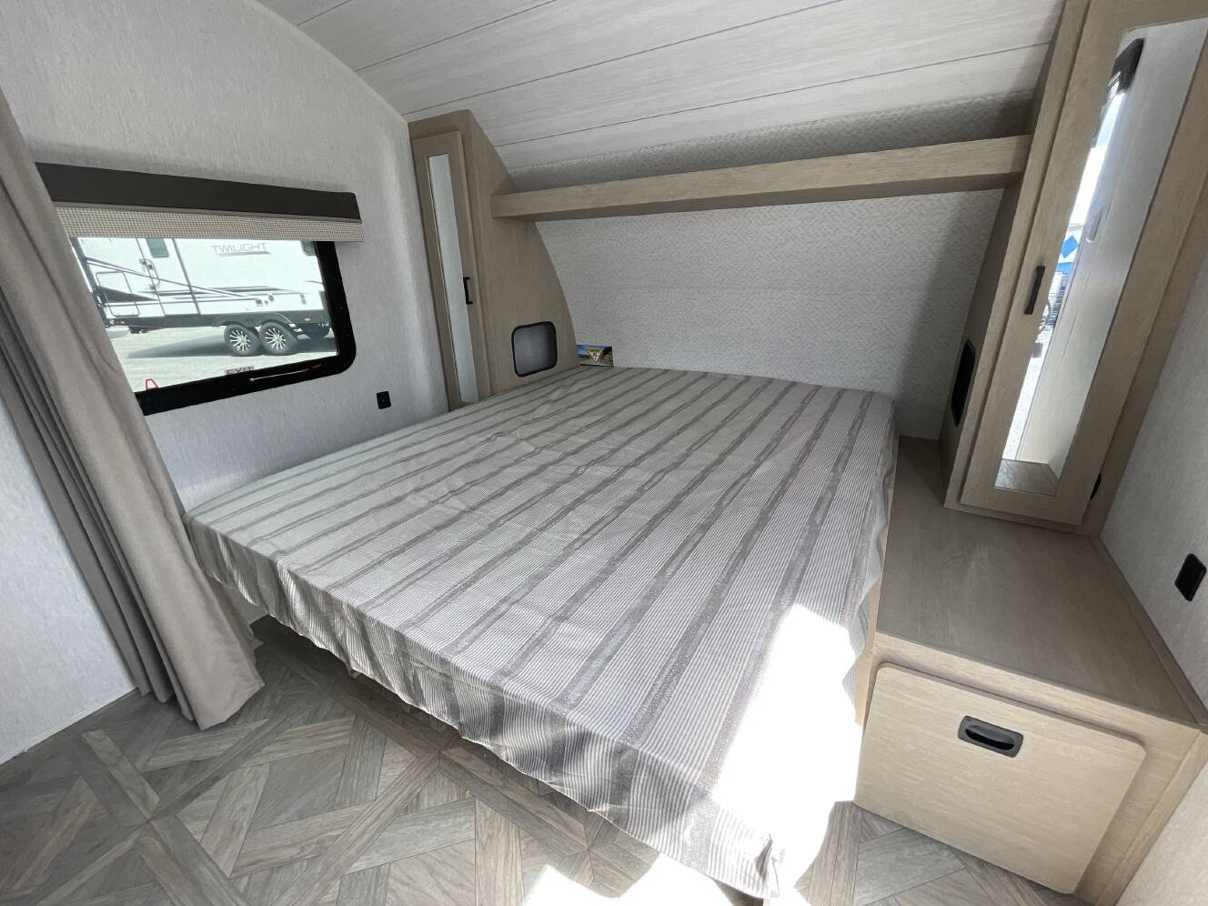 A photo of this 2023 Forest River WILDWOOD X-LITE 19DBXL