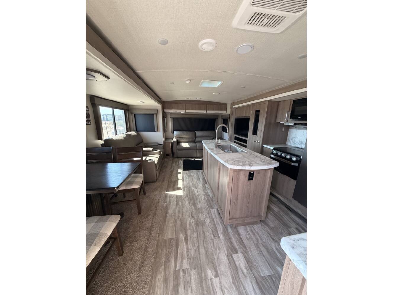 A photo of this 2021 Grand Design Imagine 2970RL 