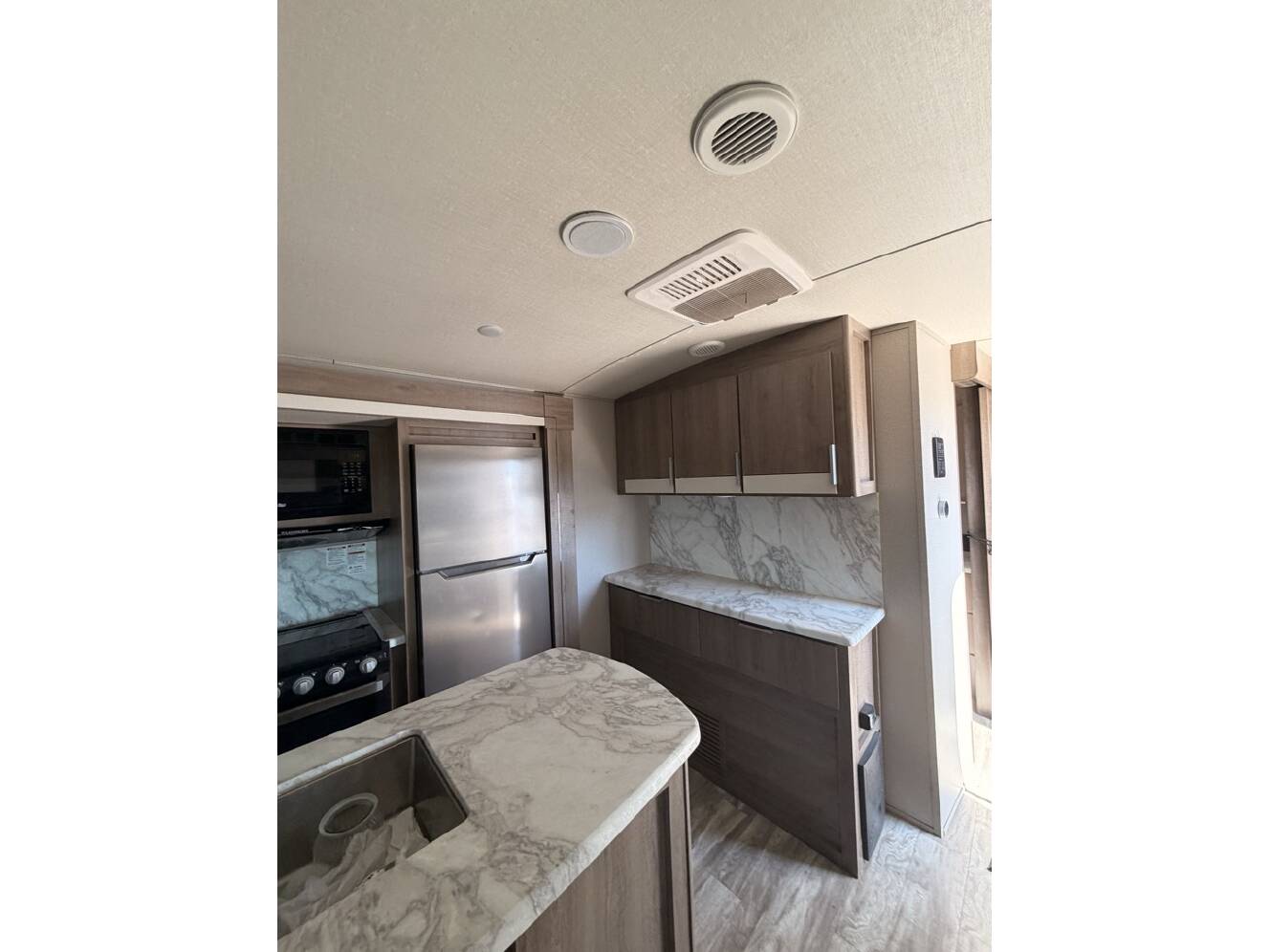 A photo of this 2021 Grand Design Imagine 2970RL 