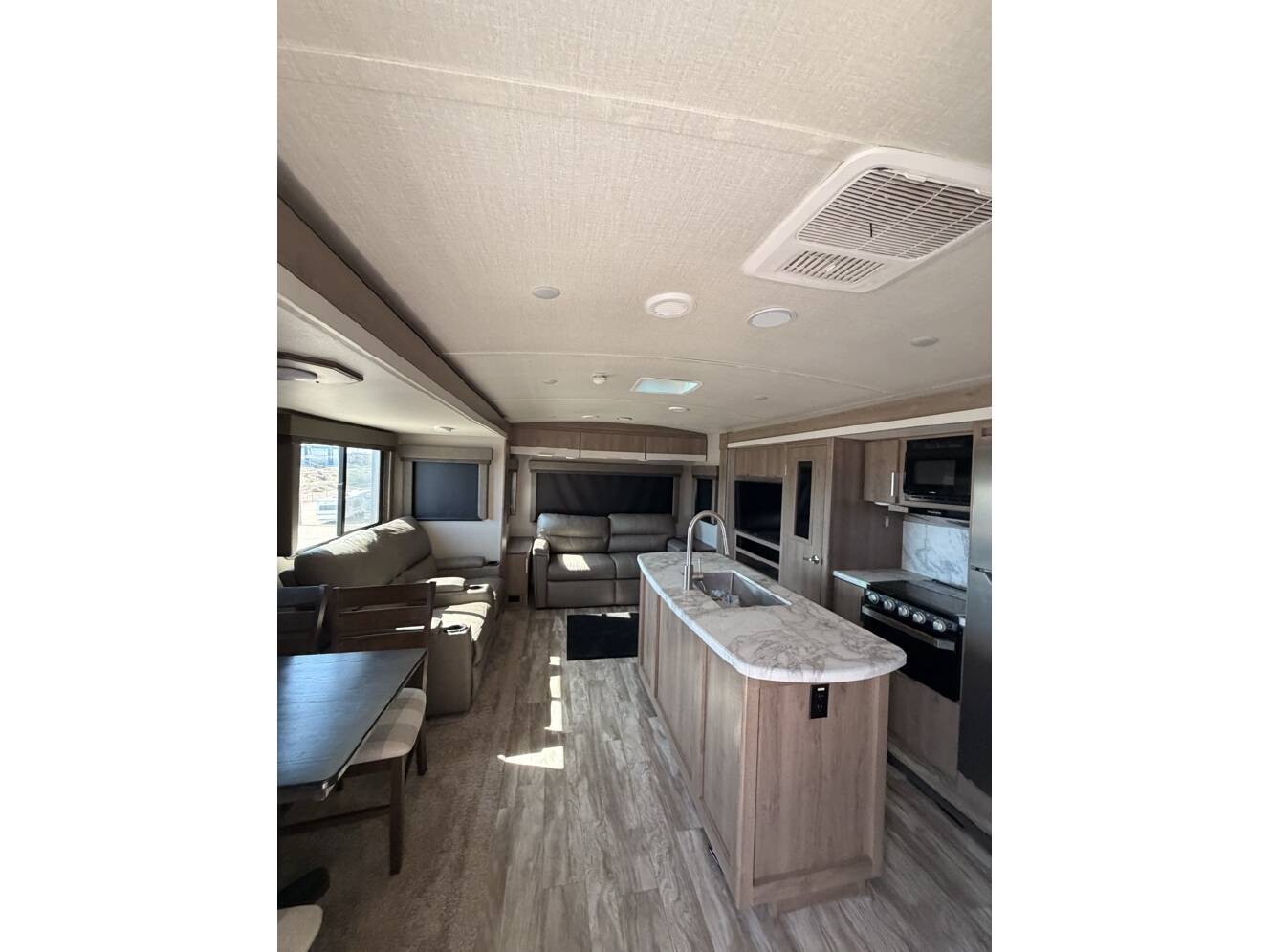 A photo of this 2021 Grand Design Imagine 2970RL 