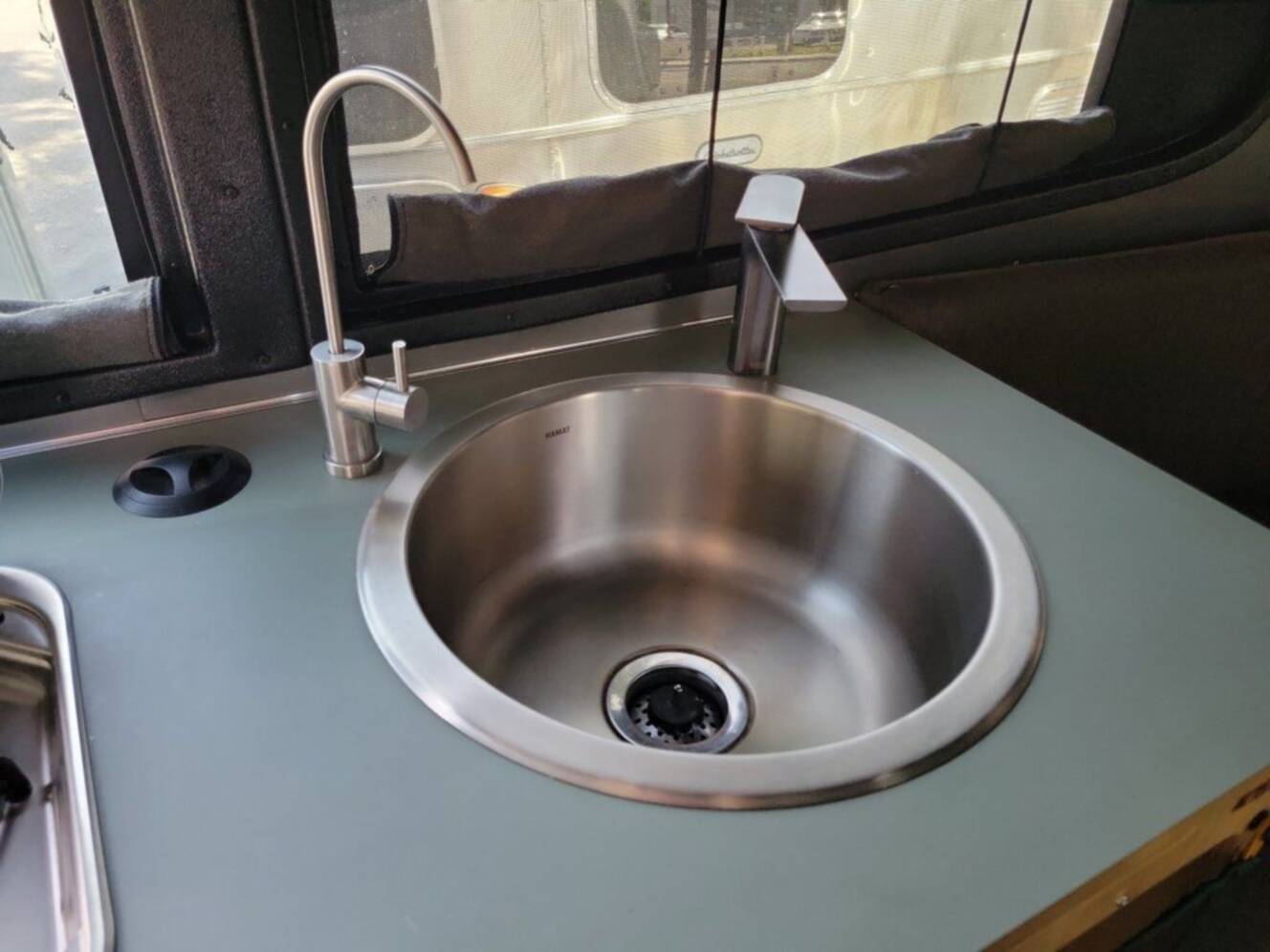 A photo of this 2025 Airstream Basecamp REI Special Edition 20X