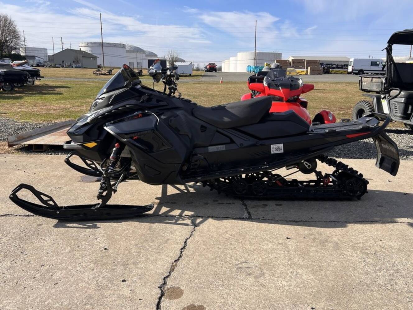 A photo of this 2025 Ski-Doo Renegade® X-RS® 900 ACE Turbo R Ice R. XT 1.5 Std_7.2