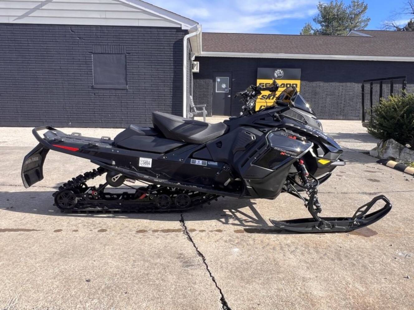 A photo of this 2025 Ski-Doo Renegade® X-RS® 900 ACE Turbo R Ice R. XT 1.5 Std_7.2