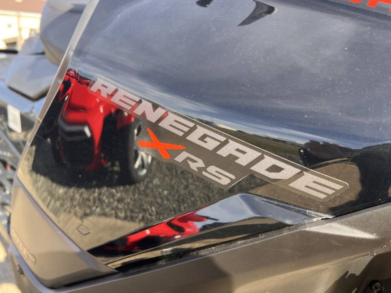 A photo of this 2025 Ski-Doo Renegade® X-RS® 900 ACE Turbo R Ice R. XT 1.5 Std_7.2