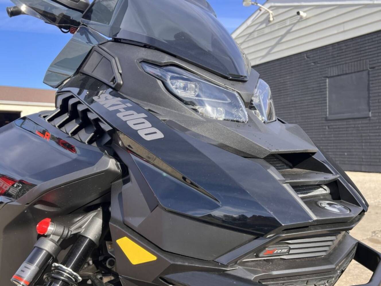 A photo of this 2025 Ski-Doo Renegade® X-RS® 900 ACE Turbo R Ice R. XT 1.5 Std_7.2